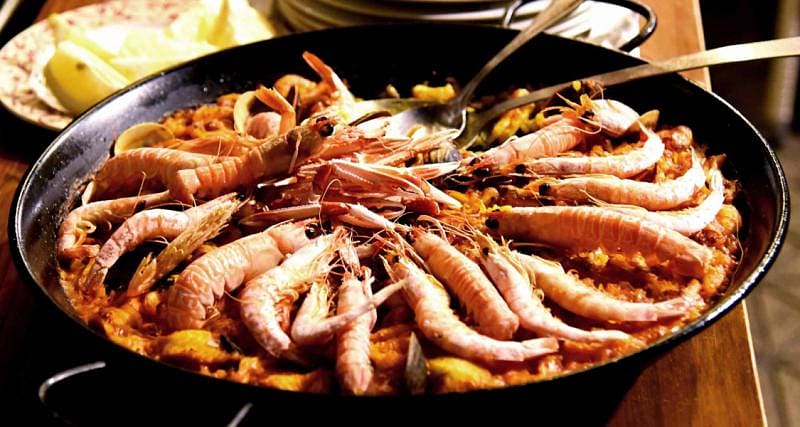 Epicurean Spain: Madrid, Salamanca, Toledo, Ibiza, Barcelona Itinerary spain seville paella tapas