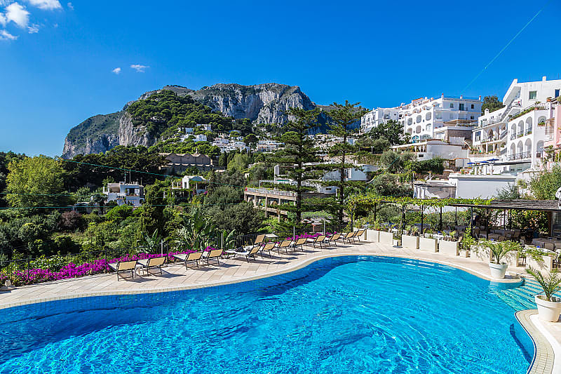 Resort pool on Carpri island with beautiful views of rocky cliffs