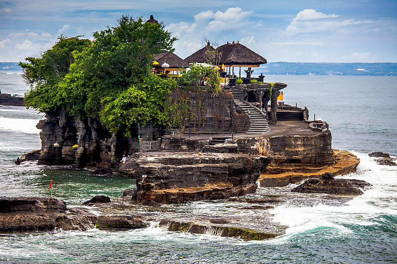 Tanah Lot in Balinese means "land in the sea", a working Hindu temple.