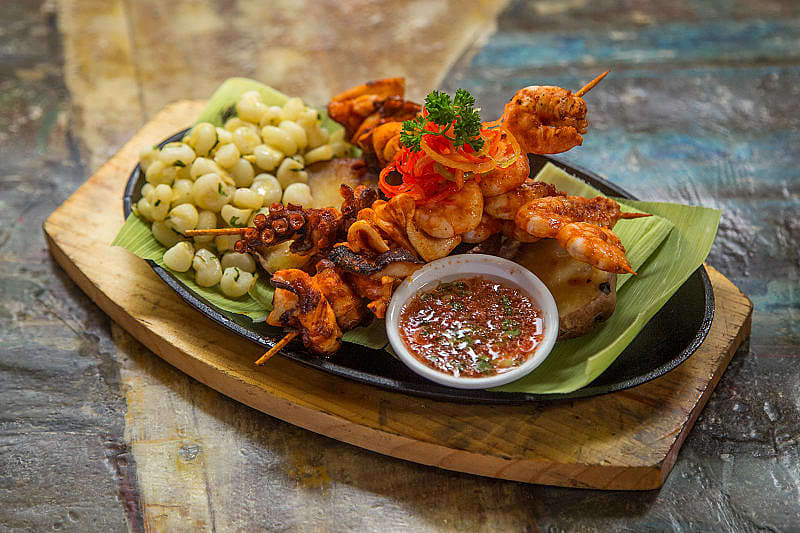 Flavors of Peru: A Culinary Tour to Lima, Cusco, Machu Picchu Shrimp and octopus main coarse at restaurant Chorillos District of Lima, Peru