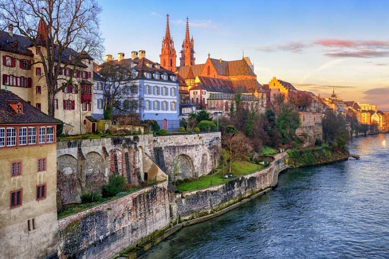 Old Town of Basel with red stone Munster cathedral and the Rhine river