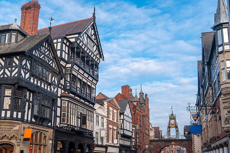 England & Scotland Heritage Tour: Retracing Ancestral Lands Half-timbered buildings with the Eastgate and Eastgate Clock in the old city of Chester, England