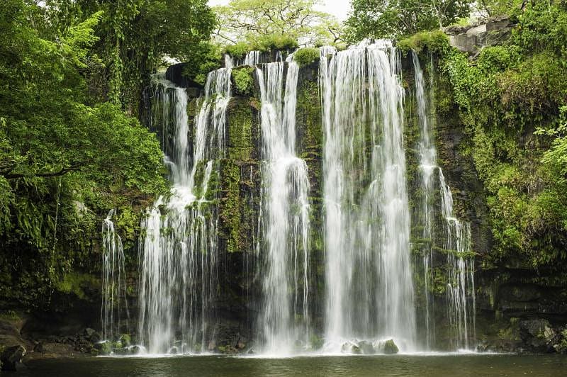 Enjoy the beauty of the waterfalls in the middle of the emerald rainforest. Costa Rica