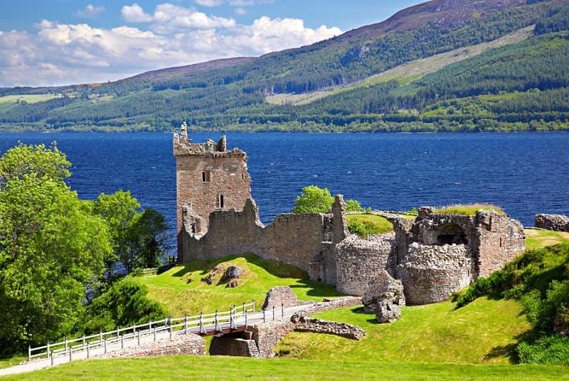 Ruins of Scotland Urquhart castle at Loch Ness view landscape