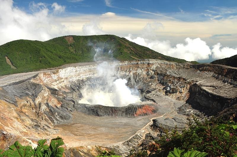 Walk the volcanic peaks and watch the steam rise right out of the crater. Costa Rica. Poas volcano.