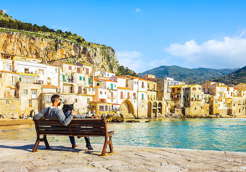 traveling couple on the waterfront, Sicily