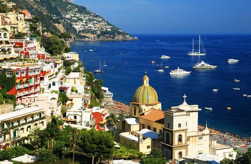 View of the colorful buildings and ocean of Positano, a cliffside village in the Amalfi Coast, Italy