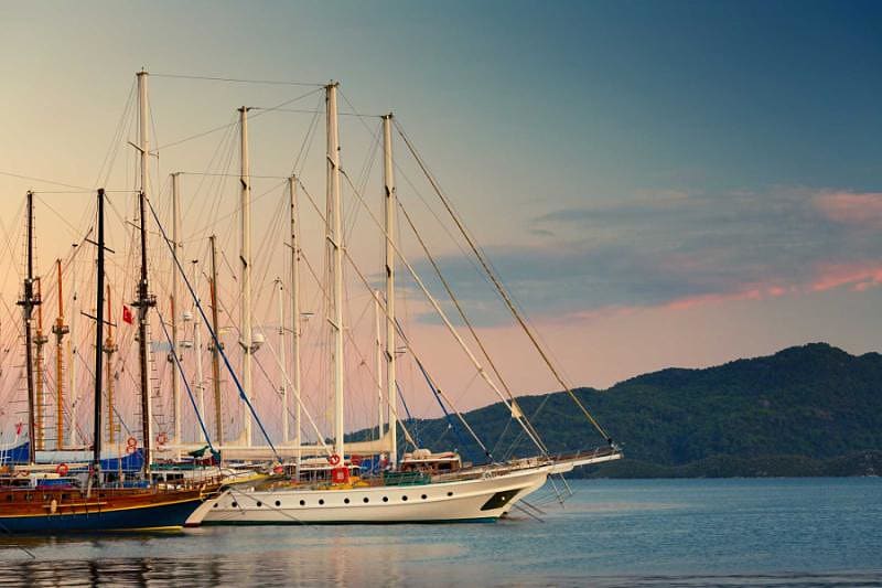 Sailing boats moored in a marine.