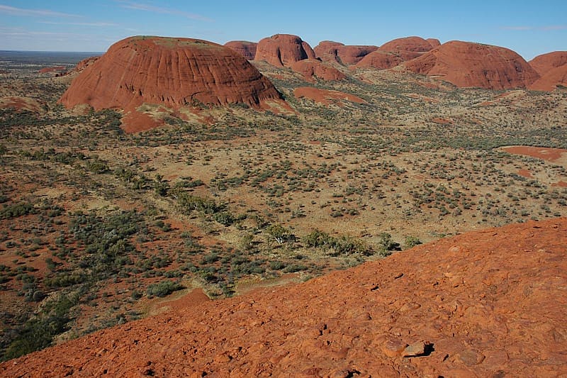 Natural Wonders of Australia Tour: Uluru to Great Barrier Reef Red sands around Uluru in the rays of the setting sun