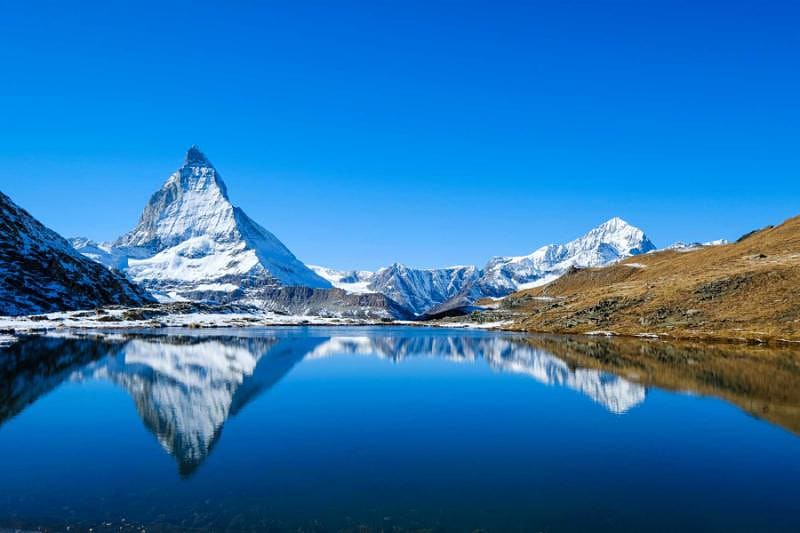 Riffelsee lake in Zermatt with the reflection of Matterhorn