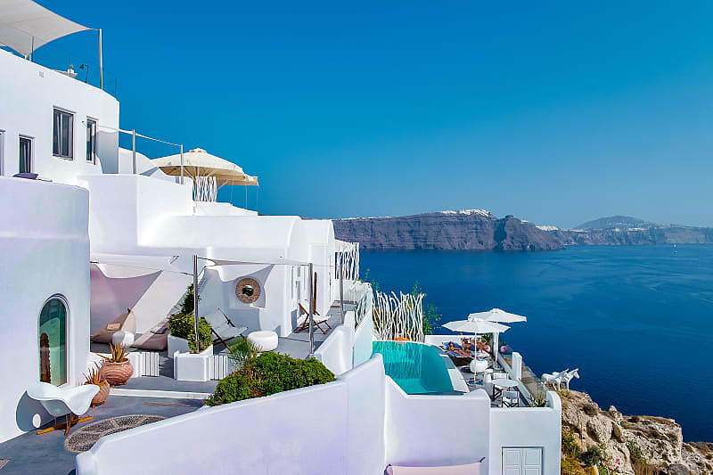 Athens & Greek Islands Honeymoon Honeymooners in Oia on Santorini Island, Greece