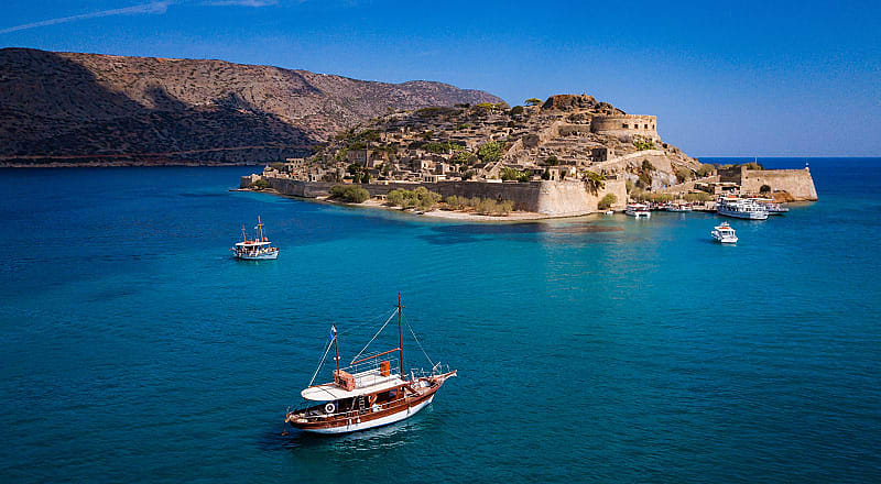Highlights of the Aegean: A Family Greece Vacation Ruins on Spinalonga Island, in the Gulf of Elounda in north-eastern Crete, Greece