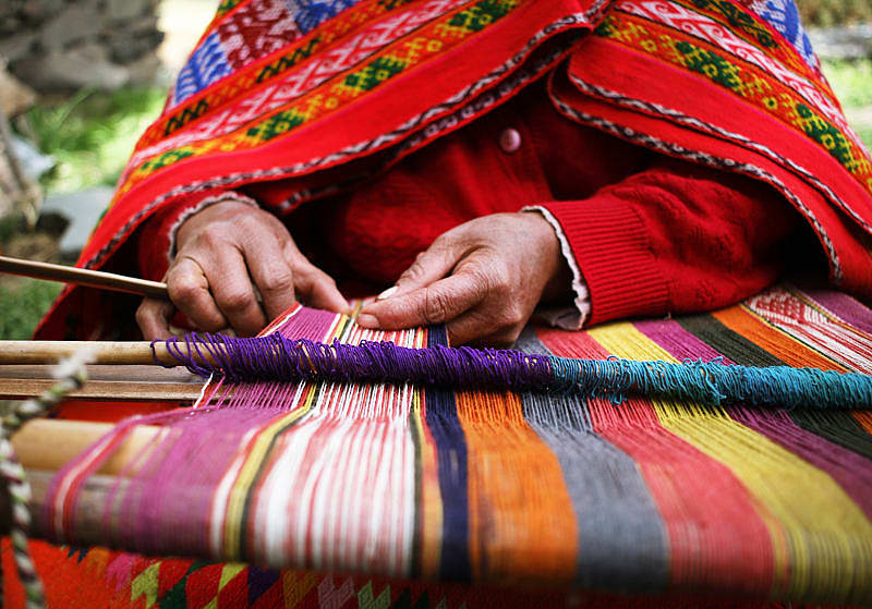 Hidden Side of Peru: An Itinerary for the Returning Visitor Close up of a woman weaving in Peru