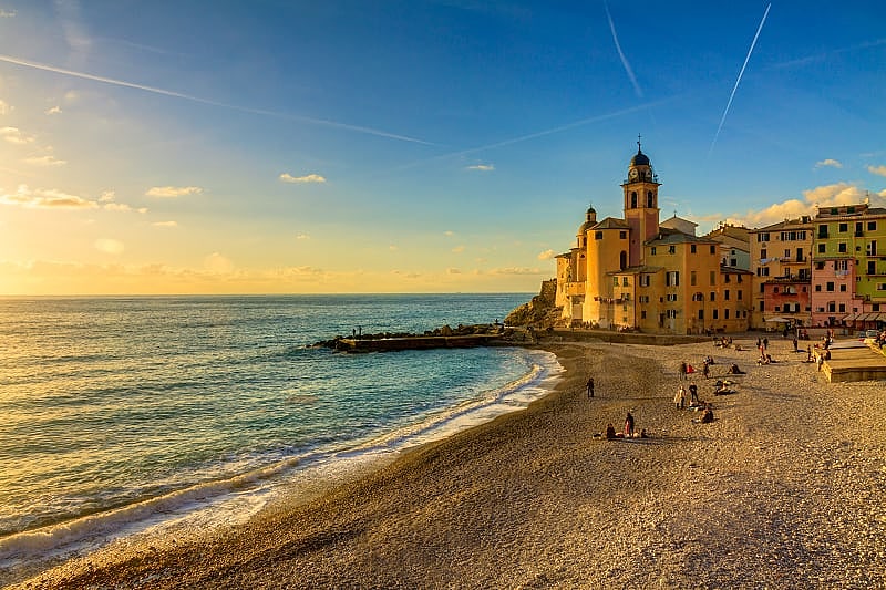Genoa Camogli is a small village in Liguria on the shores of the Mediterranean Sea. The beauty of land and sea at sunset, Genoa