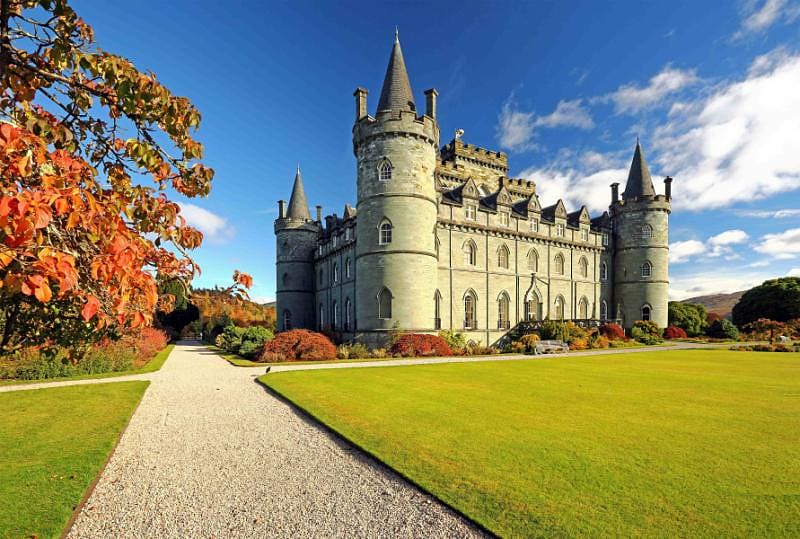 Luxury Scotland Tour: Highlands, Castles, and Lochs Inveraray Castle with autumn colors in Scotland