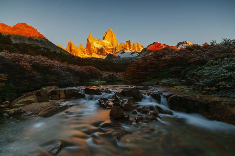 View of Mount Fitz Roy and the river in the National Park of Los Glaciares during sunrise