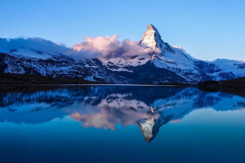 Matterhorn in the early morning with reflection in StelliSee, Zermatt