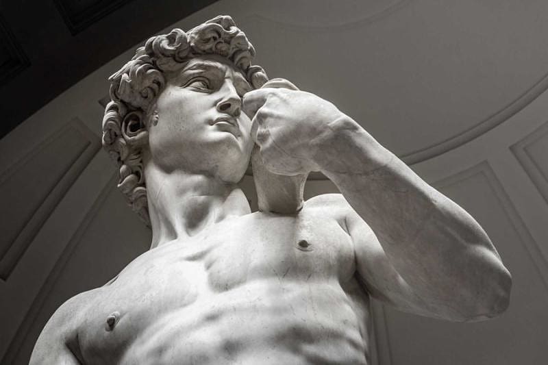 David is a marble statue by Michelangelo at the Academy of Fine Arts in Florence, Italy.