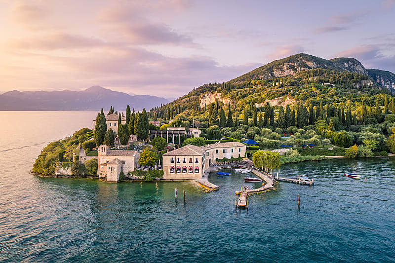 Enjoy breathtaking panoramic views of Lake Garda and the distant mountains.
