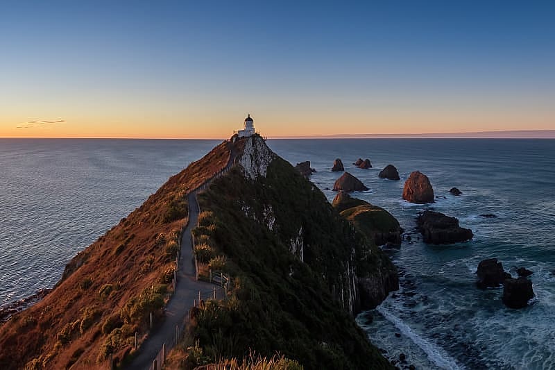 Nugget Point at sunset in Otago, New Zealand.