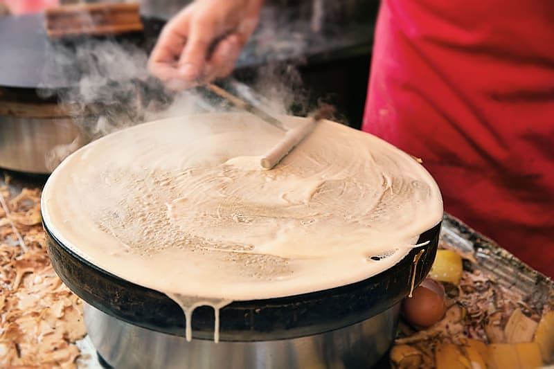 When walking around Paris you want to have a snack, stop and eat a French pancake. This is one of the most popular street food.