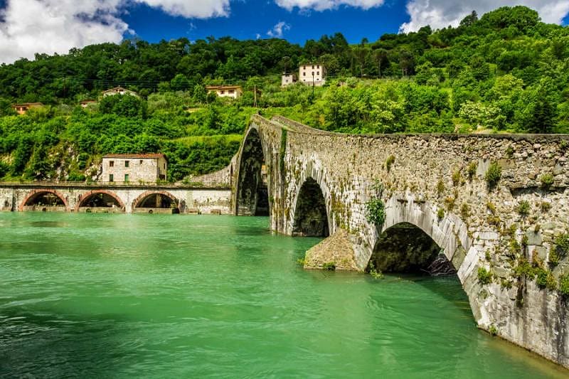 Devil's Bridge, a thousand-year-old stone bridge over the Serkyo River, Tuscany.