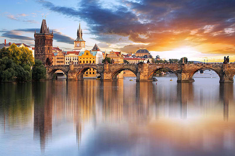 charles bridge at sunset in prague, czech republic