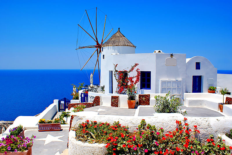 Highlights of Greece and Italy Tour Beautiful windmill villa in Oia, Santorini, Greece