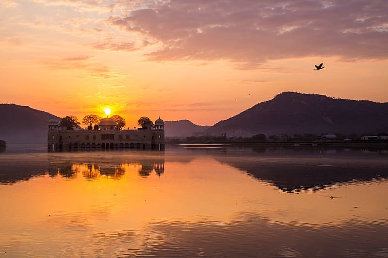 Romantic Tour of North India for Couples Romantic sunset over Jal Mahal on Man Sagar lake in Jaipur, India