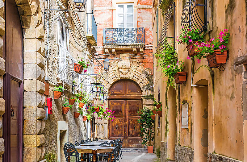 a small cafe in Positano awaits its first visitors.