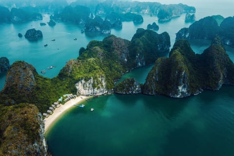 Stretch of beach on an island in Ha Long Bay, Vietnam