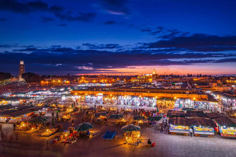 Night at busy Jemaa el-Fna market in Marrakesh, Morocco