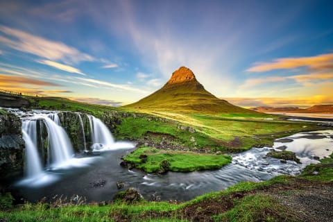 Kirkjufellsfoss waterfall with Kirkjufell mountain Iceland