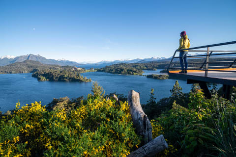 Woman standing at overlook in San Carlos de Bariloche, Argentina