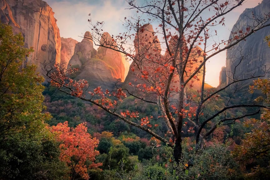 Autumn foliage and the Meteora rock formations in Greece.