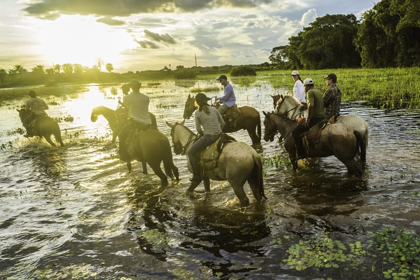 Horseback riding in Pantanal, Brazil.