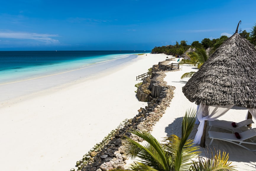 Beautiful beach by the blue waters of the Indian Ocean in Zanzibar, Tanzania