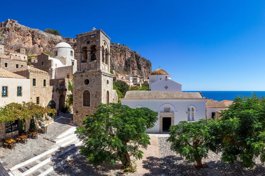 The main square of Monemvasia with the bell tower of Church of Christ ElkomenosThe main square of Monemvasia with the bell tower of Church of Christ Elkomenos