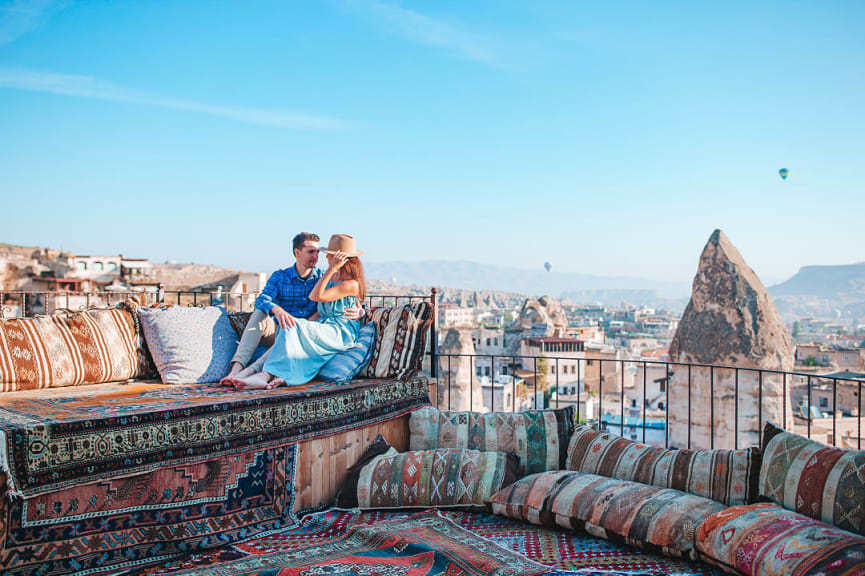 Couple on a rooftop in Cappadocia, Turkey