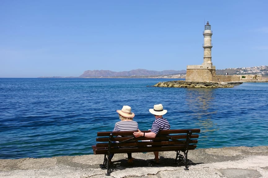 Senior couple at Chania Harbour on Crete island, Greece