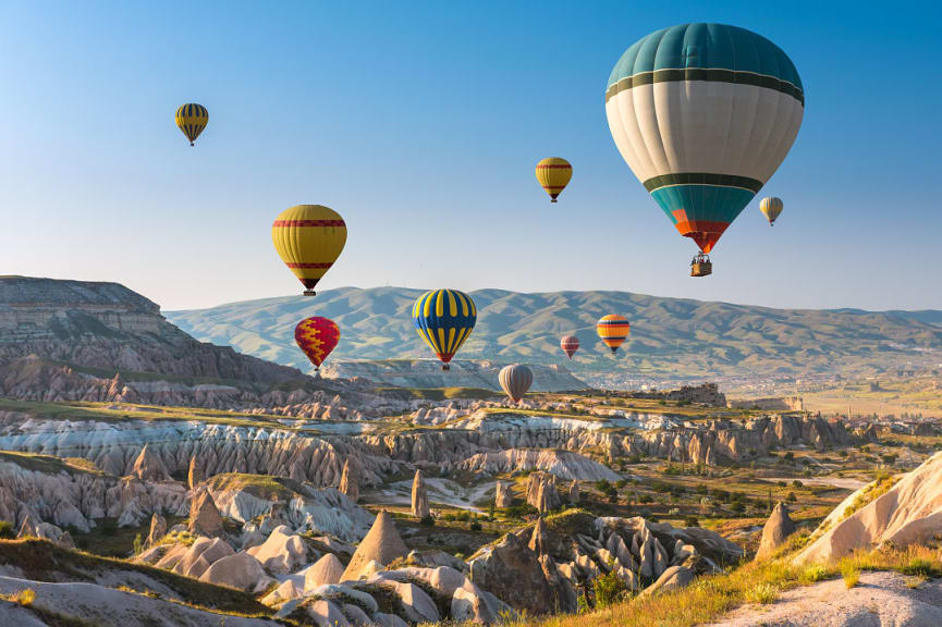 Hot air balloon floating above Cappadocia, Turkey.