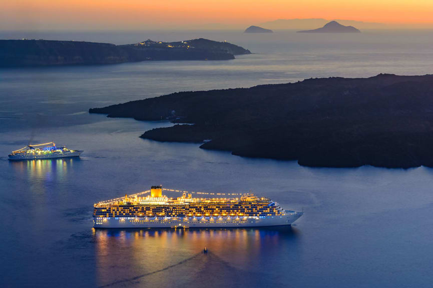 Large and medium cruise ships in the Aegean Sea surrounding Santorini, Greece