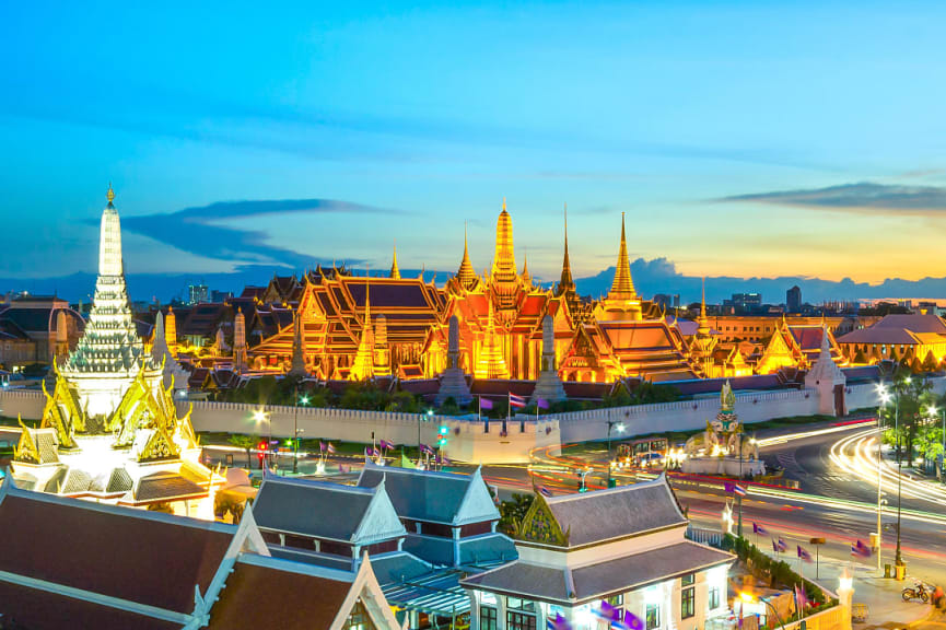 View of Grand Palace and Wat Phra Keaw at sunset in Bangkok, Thailand