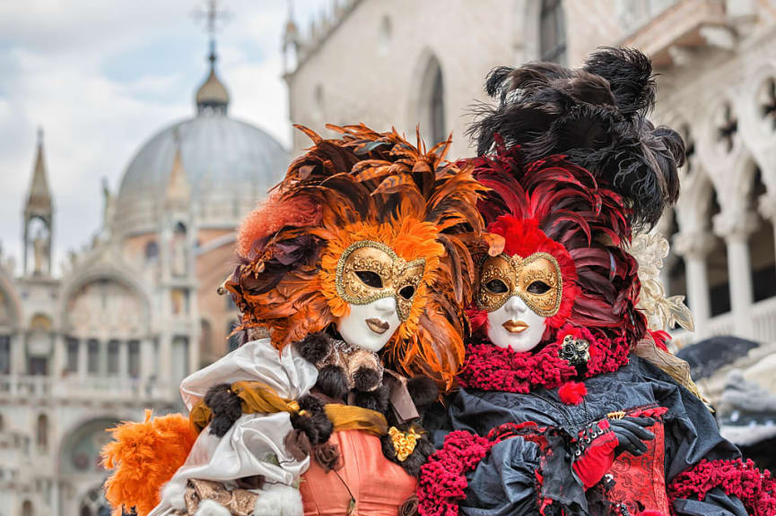 Masked revelers at Carnival in Venice, Italy