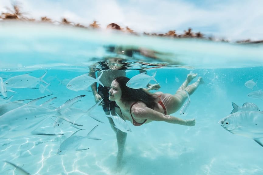 Couple swimming in the Maldives