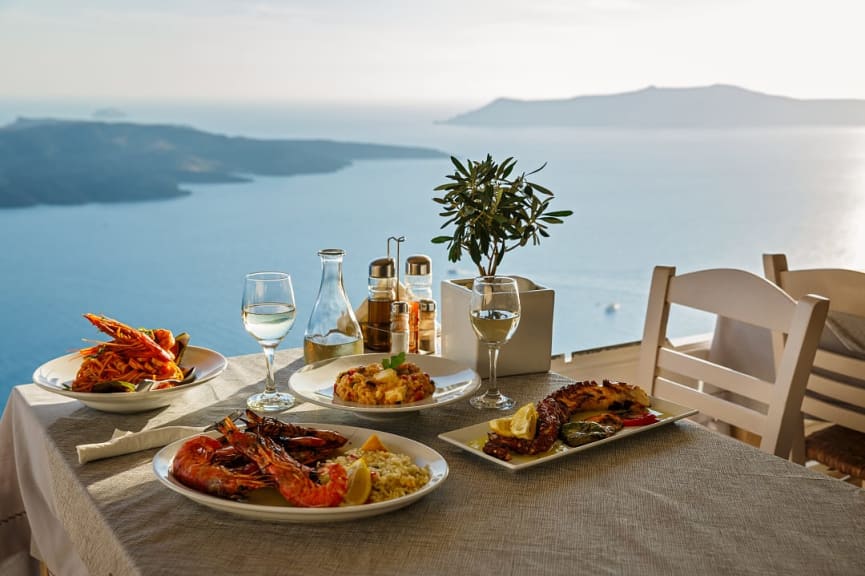 Dinner at sunset in Santorini, Greece