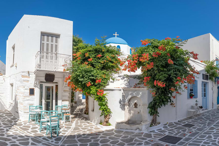 Cozy street with cafe in Parikia on Paros Island, Greece