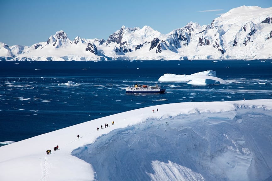 Tourists hiking while on an excursion in Antarctica