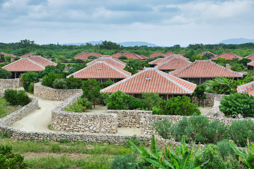 Houses with red tiled roofs on Taketomi Island in Okinawa, Japan