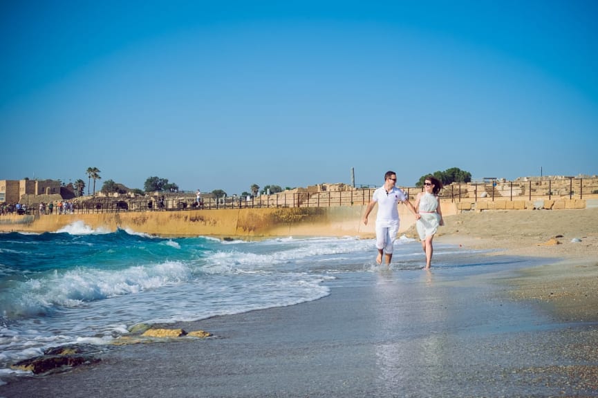 Couple on the beach in Caesarea, Israel